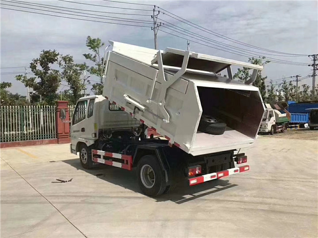 凱馬藍(lán)牌壓縮對(duì)接帶翼展垃圾車(chē)